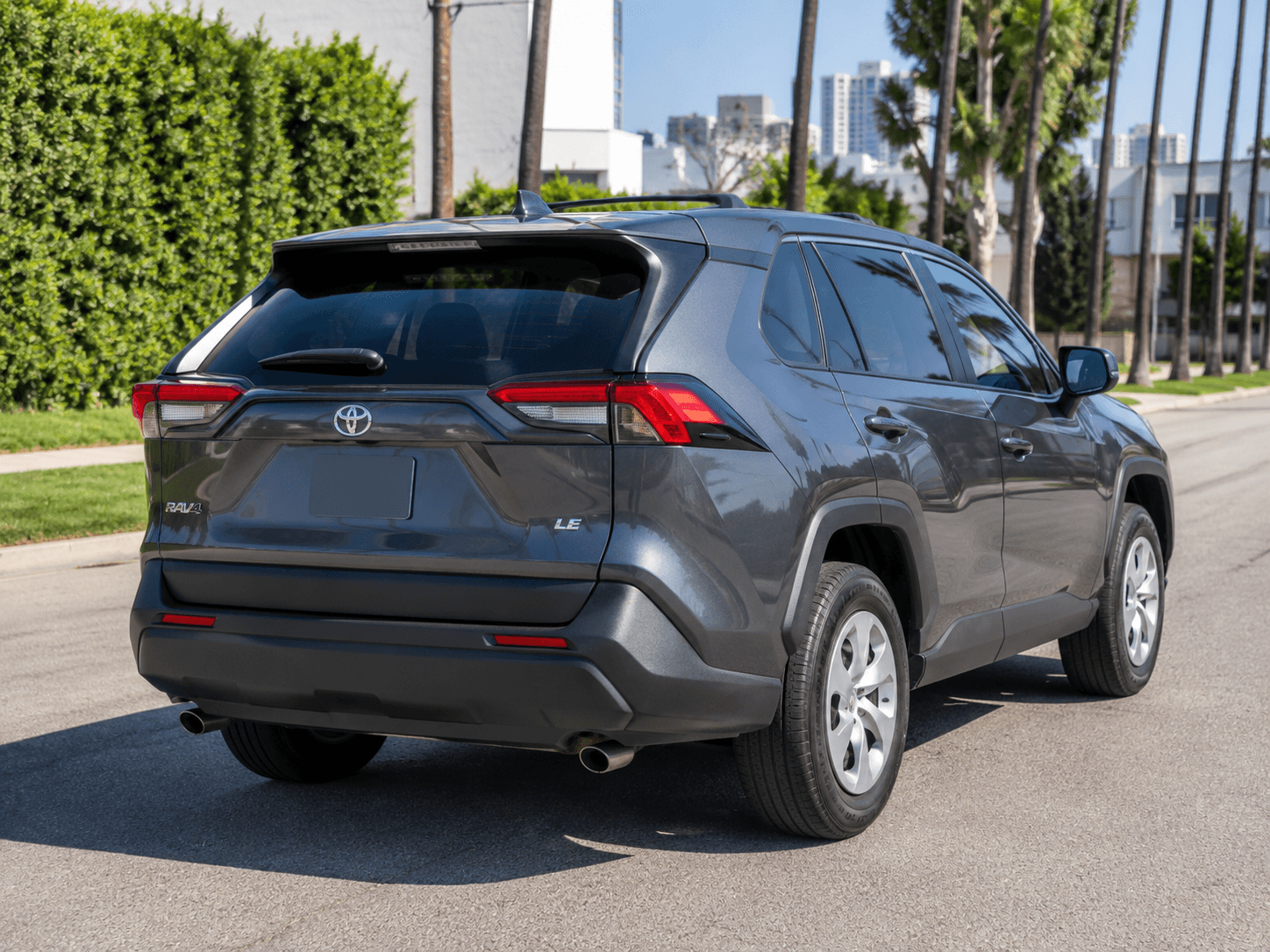 2023 Toyota RAV4 LE — LAX pickup/drop-off rear_3q