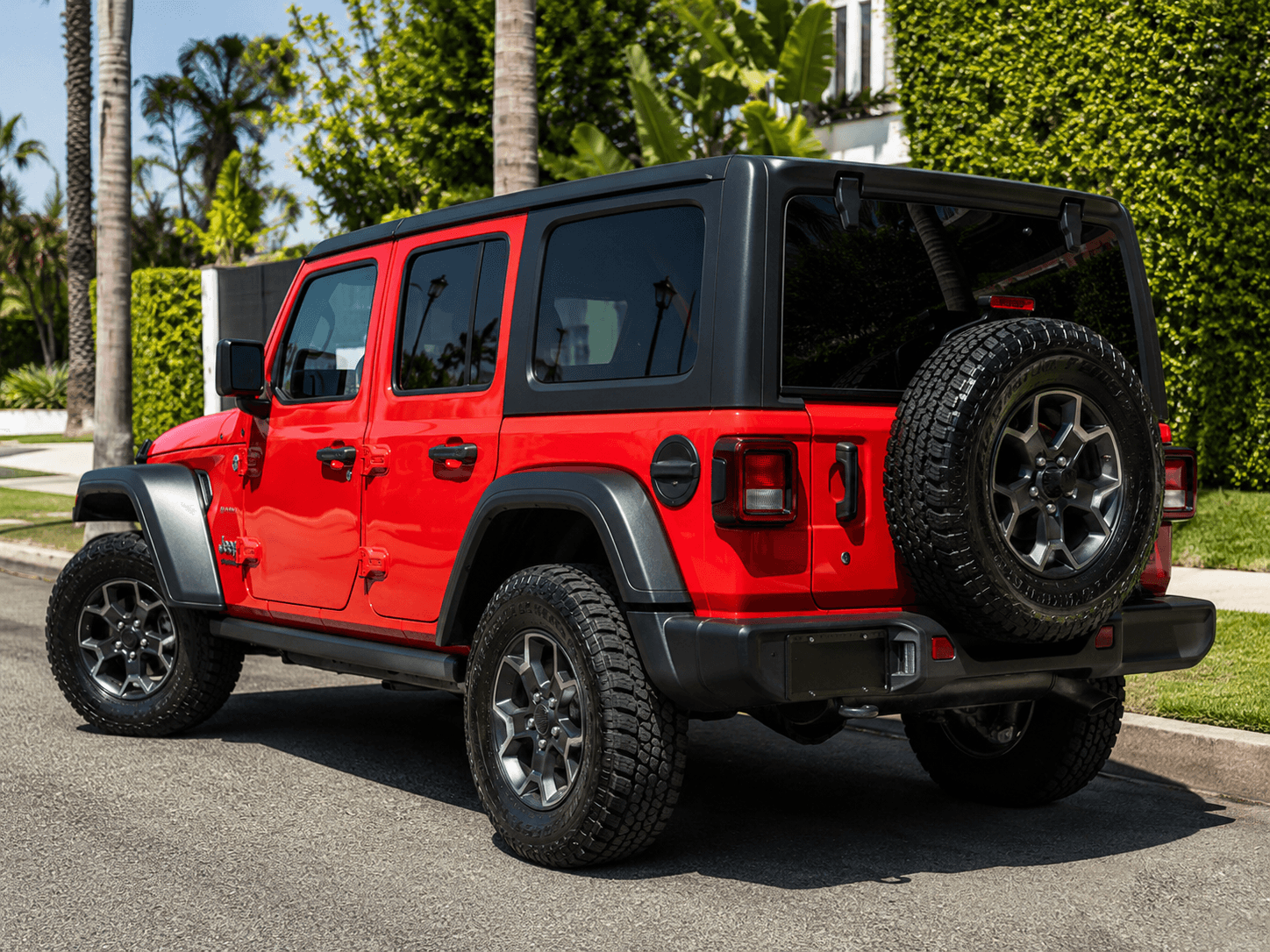 2022 Jeep Wrangler Sport 4xe — beach day ready rear_3q