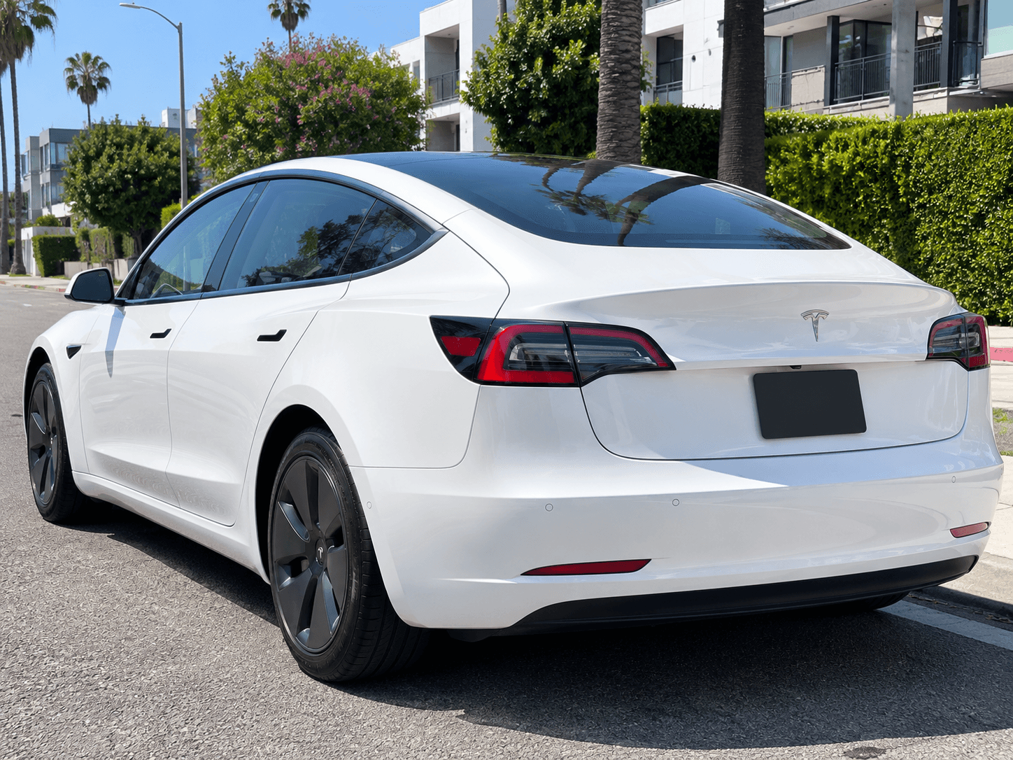 2023 Tesla Model 3 Long Range — 330mi range rear_3q