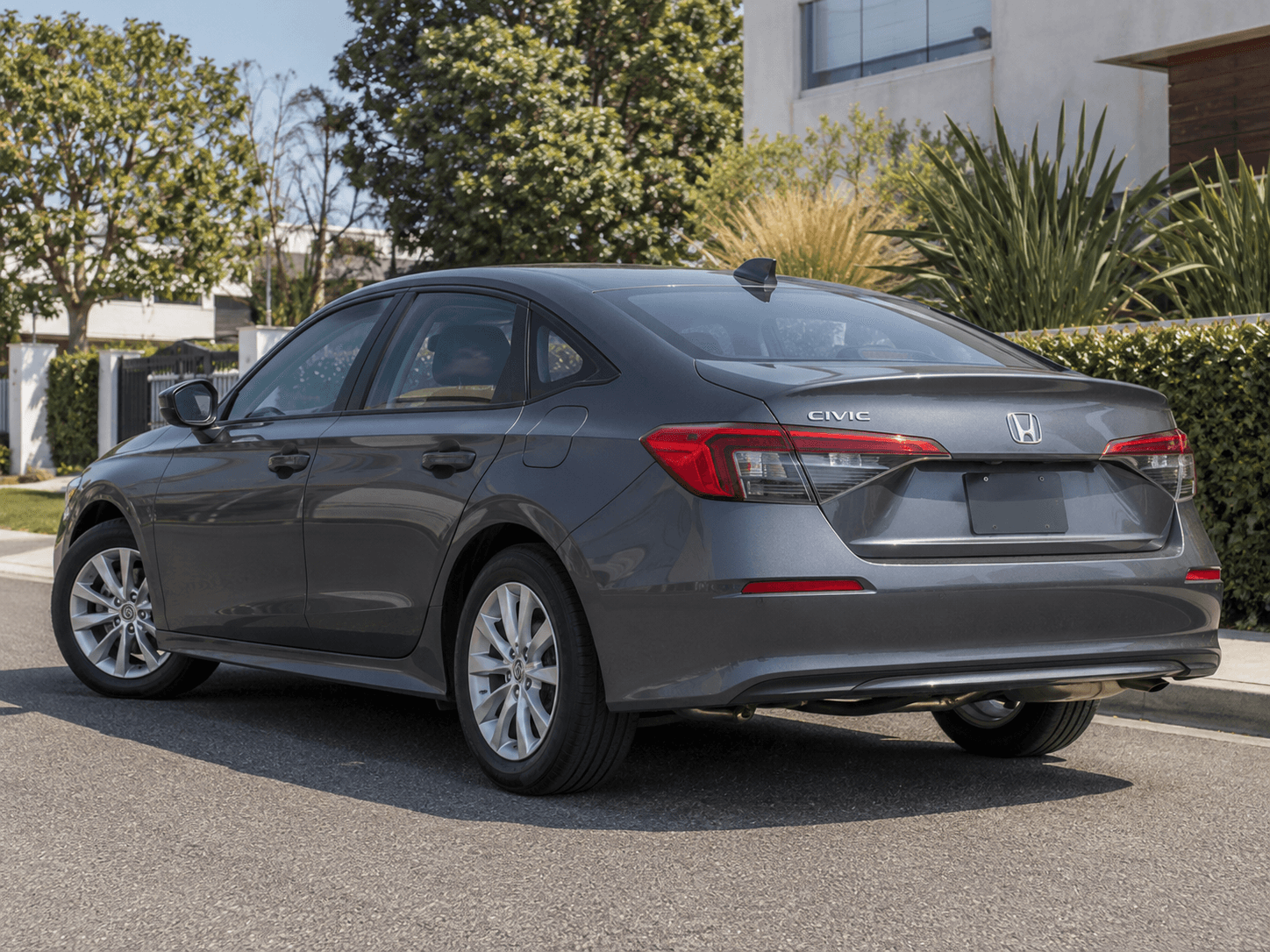 2023 Honda Civic LX — LAX pickup/drop-off rear_3q
